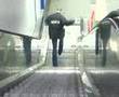 walking down the escalator