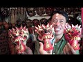 Joe Polish and Lisa Wagner buy Restoration Masks in Bali :)