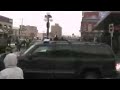 Barack Obama's car waiting for him while he is buying a beavertail in the Byward Market, Ottawa, Canada, and then being cheered by the crowds