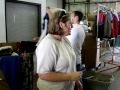 Inside the Open Door Video - Creigton University Pre Law - hanging donated clothes