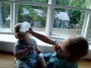 Cecily gives Dominic a bottle