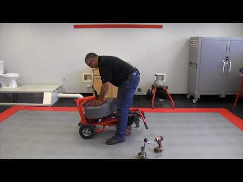 Swapping out the drum on the RIDGID K7500 drain cleaning machine