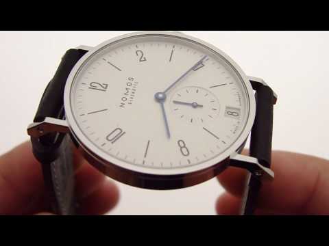 keepthetime - Buy this watch at http://KeepTheTime.com * Nomos Glashutte Tangente Datum (ref 130) in new condition, unworn * Automatic self-winding mechanical movement o M...
