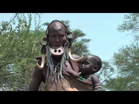 nude african tribal women - http://www.african-road-trip.com/ Mursi people - native African tribes in the Omo valley in South of Ethiopia. They live in an area that is surrounded by hig...