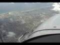 cessna 172 flies over an antonov 124