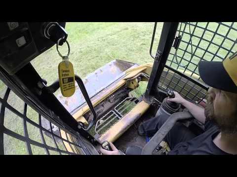 how to drive a skid steer