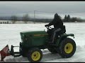 snow-plowing-with-john-deere-755.html