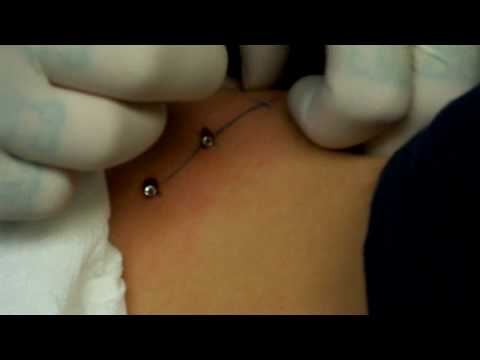 Very cute hip piercing. They use a huge needle about three inches long and Very cute hip piercing. They use a huge needle about three inches long and