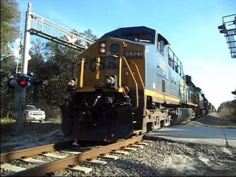 CSX locomotive - This is the longest freight train I have ever recorded near my home town. It has 7 locomotives and 123 cars. At the location where I was filming it started p...
