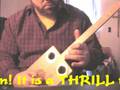 Incredible playing cigar box guitar dulcimer strumstick