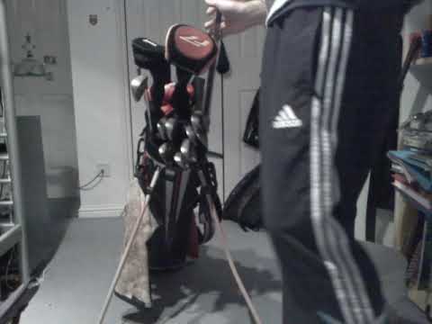 my golf clubs with scotty cameron ping i10s 3 vokeys watch!!