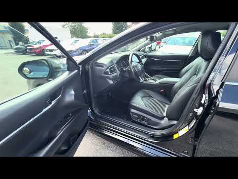 Used 2023 Midnight Black Metallic Toyota SE image 1