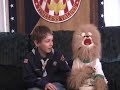 Buttons, the radical Boy Scout, in 