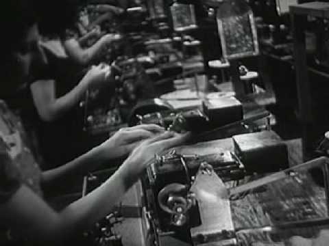 automobile - Tour of an auto parts and accessories factory climaxing with a stop-motion product parade. The Electric Auto-Lite Company Presents.