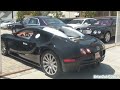 BrianZuk records two Bugatti Veyrons @ O'Gara Coach Company, a cream white and light blue Veyron, and an all black Veyron which starts up it's 1001hp W16 Engine and re-parks.