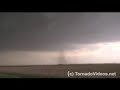 Video of RAPID rotation with a ground-scraping wall cloud with a tornado producing supercell in Western Kansas on May 22, 2008.  At least 2-3 small tornadoes, as well as a cone were documented on this storm. Check out TornadoVideos.net for our live streaming video, breaking news, and extreme tornado footage.