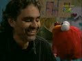 sings Elmo to sleep