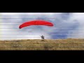 Flying near clouds in Hawaii. Paragliding training at Pu\ Flying near clouds in Hawaii. Paragliding training at Pu\