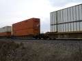 A long eastbound stack train with domestic containers passes CP 139.5 west of Edelstein on 11-9-09. Three Dash 9s[4163,4971,5309] lead this long train while two more Dash 9s[688,4958] push in DPU mode. The 688 is still in decent Super Fleet colors. ... BNSF Chillicothe Sub Transcon IL C44-9W Super Fleet Warbonnet CP 139.5 