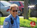 Cop Kicks Dog