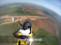 The camera is mounted on the Pylon Cover just below the Rotor. Unfortunately the camera angle bracket amplifies the motor vibration thru the airframe and Pylon giving it a wably image. Next try will eliminate this bracket extension. Music from Plate Mix.
