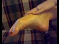 Stacia Rubbing Her Feet