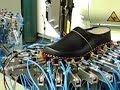 Kawasaki robot tacking wooden clogs Kawasaki robot tacking wooden clogs
