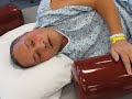 Quadriplegic, Masi Sala, uses his shoulders and stomach muscles to roll over.