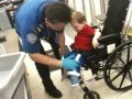 TSA Nabs Suspected Al Queda Terrorist At Chicago Airport, A toddler in a wheelchair