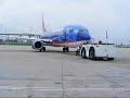 Pushback of Sun Country 737-800 at D/FW