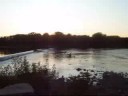 LISTENING TO CAR RADIO AT WILMINGTON DAM ON KANKAKEE RIV