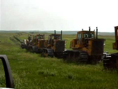 Allis - Fiat Allis Bulldozers digging in new water line about 6 feet deep.