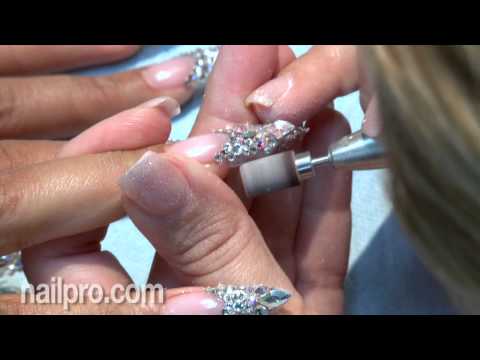 swarovski - Nail artist Gina Silvestro created stunning sparkling tips with gel and real Swarovski crystals for the December 2012 NAILPRO cover. http://www.nailpro.com.