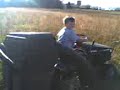 Micah Riding the Lawn Tractor.3gp
