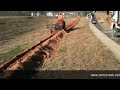 Trench backfiller on sk650