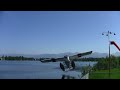 This is a video of the deHavilland beaver plane crash at Lake Hood in Anchorage AK, on June 7, 2009. My father and I were videotaping planes at Lake Hood taking off and landing when the wind kicked up and sent the Beaver taking off right at us. The wing was less than 5 feet over our heads, and the radial engine was less than 8 feet to my left. No exaggeration!! The Slow motion at the end gives a little better look at how close it was. Everyone onboard was in pristine condition, 2 adults, 2 ...