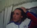 Boi e Diogo com sua jaqueta da Lar.