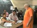 Narendra Modi casts vote ifor 2012 Gujarat ...