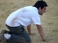 corrida de cerdos engrasados