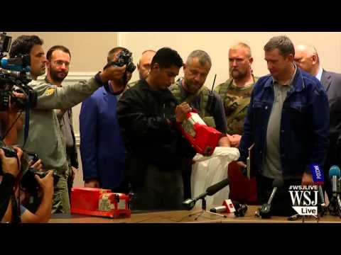 17 - The refrigerated train carrying the remains of those killed aboard Malaysia Airlines Flight 17 has reached the government-controlled city of Kharkiv, finishi...