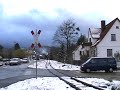 Steam Train of the HSB nearly hits a Car in the Snow in Drei Annen Hohne, Germany Steam Train of the HSB nearly hits a Car in the Snow in Drei Annen Hohne, Germany