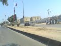 cars burnt after benazir's assasination in karachi's nipa and aladdin areas