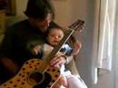 Gibby Michaelson and Sebastian on guitar