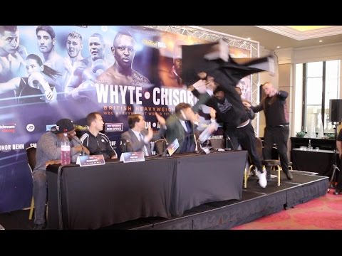 Boxer Hurls Table At Opponent During British Heavyweight Title Presser
