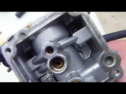 How to clean a carburetor on an 8hp Mercury outboard engine