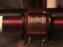 Special bipolar Tesla coil exhibiting capacitive coupling in free air.