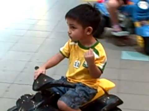 Asees driving the motorcycle