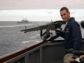 A collection of photos of the weapons department personnel and various weapons onboard the Mustin.