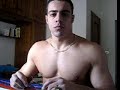 hot-man-flexing-muscles-posing-on-webcam.html