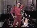 Olivia Newton-John Physical with footballers